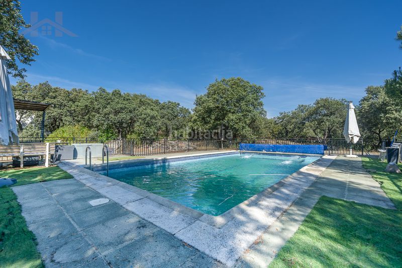Foto fea2a065-f3f2-4b2b-9679-6a18f56e6f07. Xalet amb xemeneia aparcament piscina a Las Zorreras-Monte Encinar Escorial (El)