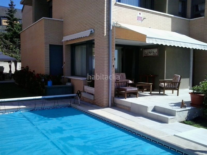 Foto 7a14e395-a0a8-4d89-925a-3d611b83241d. Casa aparellada amb calefacció aparcament piscina a Escorial (El)