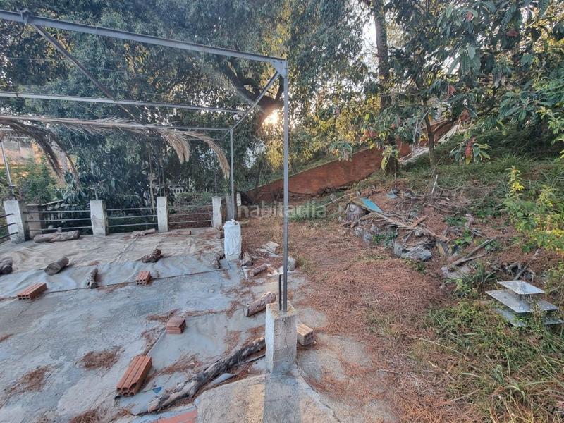 Foto c0933c7c-e7d1-4172-907e-bc9b621ecdf9. Terreno residencial terreno con pequeña construccion en Dosrius