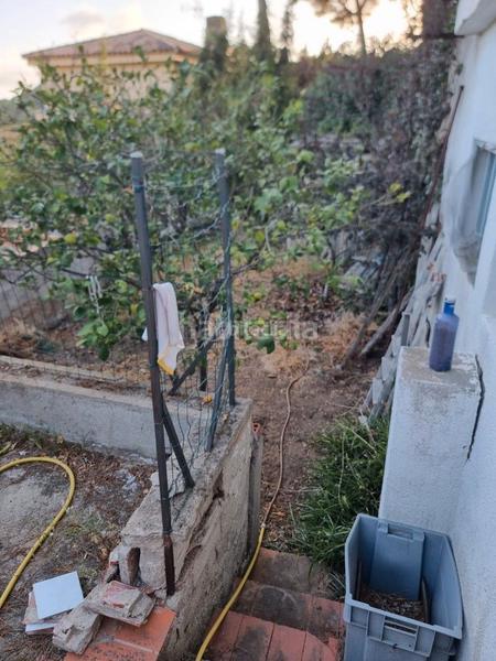 Foto d789f802-255f-432d-b172-645de2dfe0aa. Terreno residencial terreno con pequeña construccion en Dosrius