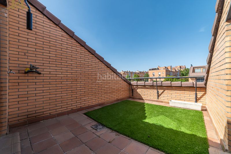 Foto 880837d1-00d4-40f7-a346-46463c6217cb. Casa aparellada amb calefacció aparcament piscina a Leganés