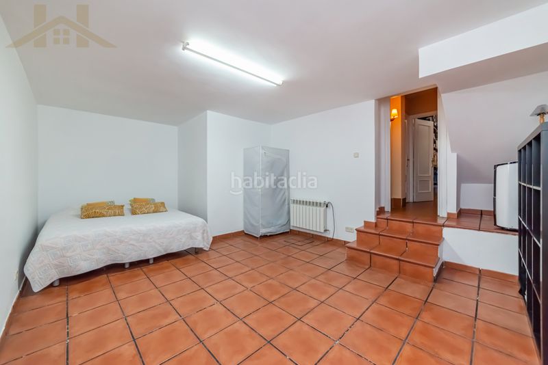 Foto b2621712-4d01-433f-a355-7731c899df39. Casa aparellada amb calefacció aparcament piscina a Leganés