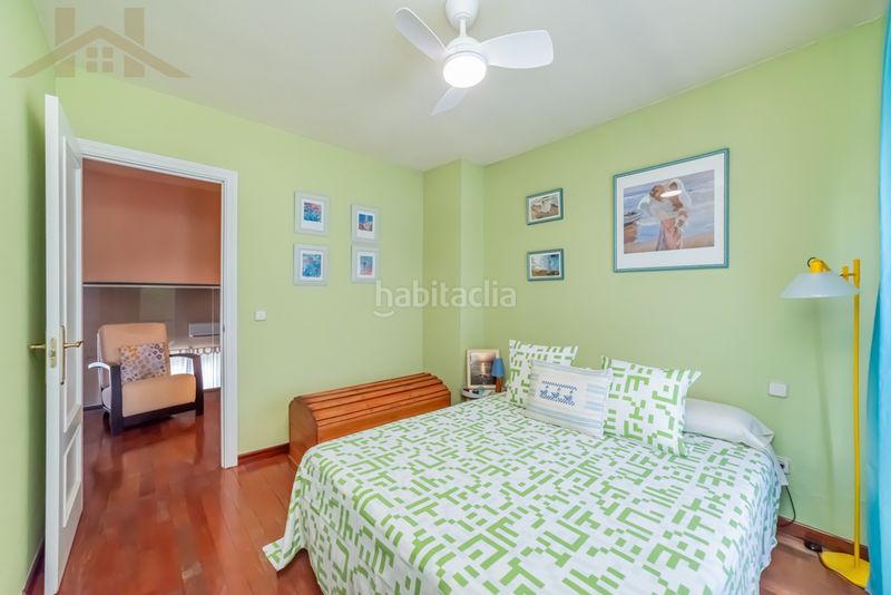 Foto e5c7fc90-d4e7-4325-81ba-7ca811d07ef9. Casa aparellada amb calefacció aparcament piscina a Leganés