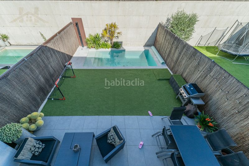 Foto a9fb4ddf-9a21-4324-9091-4b1469156db4. Casa adossada amb calefacció aparcament piscina a Boadilla del Monte