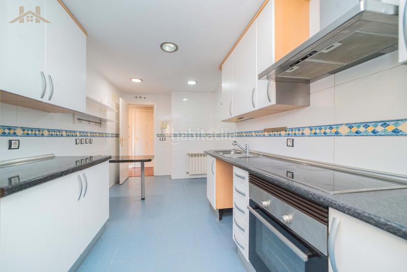 Foto ef5a83a3-9cd1-4c51-b2bd-bfd5a3b04e39. Planta baixa amb calefacció piscina a Sector B Boadilla del Monte