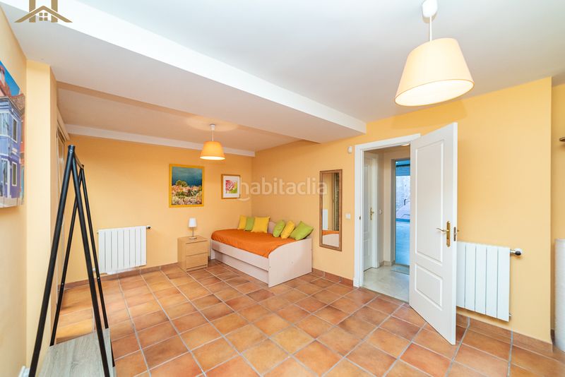Foto f8fae3bb-b3fc-48c1-a532-497ced909a3a. Casa adossada amb xemeneia calefacció aparcament piscina a Boadilla del Monte
