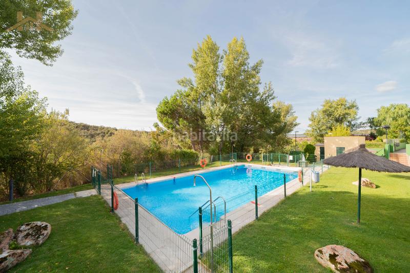 Foto d8b3153c-54df-461f-a458-4b3d9d56394a. Casa adossada amb aparcament piscina a Parquelagos-Puente Nuevo Galapagar