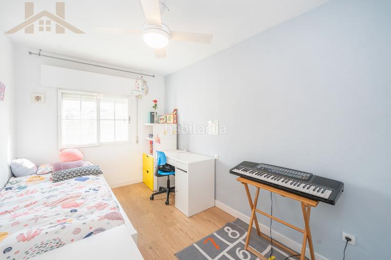 Foto 2d9eb41f-63b4-4152-b612-9b6e9110ffcc. Casa adosada chalet adosado en venta en calle guindal en Colmenarejo