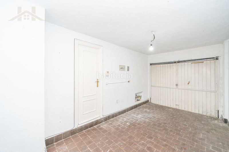 Foto bf23a48e-4197-4ce1-af74-b78e5386bd72. Casa adossada amb xemeneia calefacció aparcament piscina a Galapagar