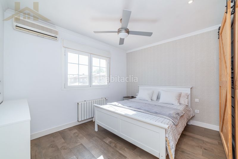 Foto 11cc52d5-65dc-4088-b32b-fdcef50d1bfd. Casa adossada amb xemeneia a Las Lomas Seseña