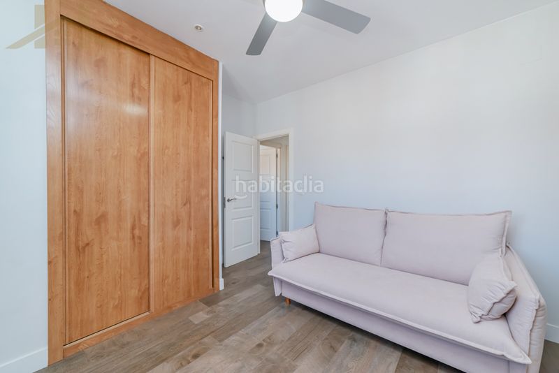 Foto d104635f-943c-4dd8-8a62-72fd7943f21a. Casa adossada amb xemeneia a Las Lomas Seseña