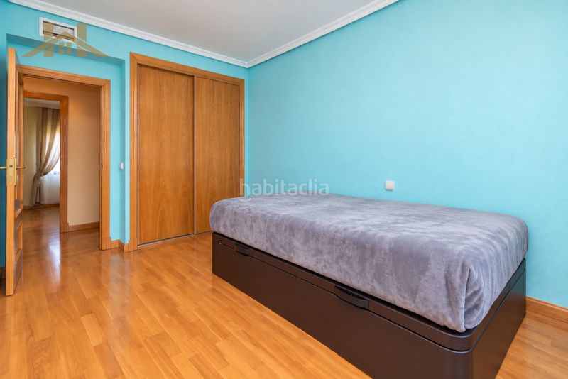 Foto 5f3f182c-63d1-4867-8a10-e50a03d198ce. Casa aparellada amb xemeneia calefacció aparcament piscina a Majadahonda
