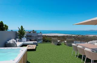 Apartament a Playa Tamarit-Playa Lissa. Costa blanca eiendom presenta este fantãstico ãtico con solãrium