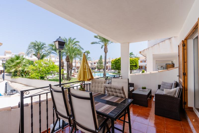 Foto f6b6e76a-ed0b-433b-96ac-f5c32c0c82e3. Casa adossada amb aparcament piscina a Monte Faro-Altomar II Santa Pola
