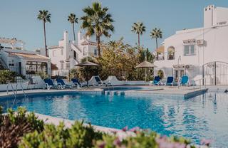 Casa bifamiliare in Villamartín-Las Filipinas. Costa blanca eiendom presenta esta encantadora vivienda tipo dãp