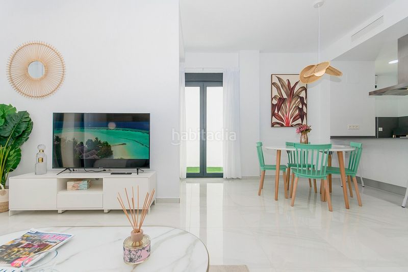 Foto ca4ebb7e-c442-4bdc-b3ea-ce3367bf13cd. Chalet en vistabella golf villa de 3 dormitorios y 3 baños con piscina y jardín en vistabella golf en Orihuela