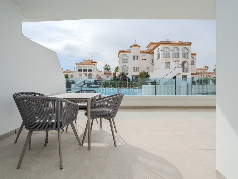 Foto 45567e91-6171-4a72-87f2-1409b22875a1. Pis amb aparcament piscina a Playa Flamenca Orihuela