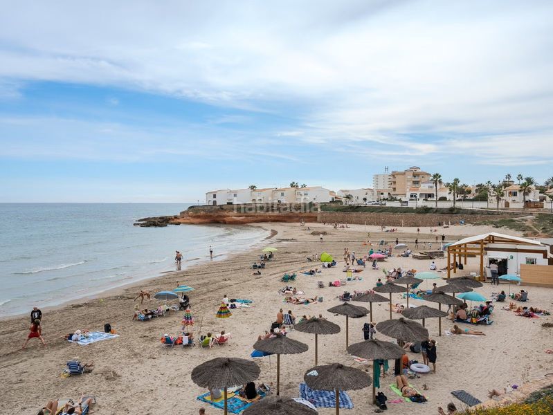 Foto f0ebf2b5-6165-4114-913a-a94c2eb2b8e8. Pis amb aparcament piscina a Playa Flamenca Orihuela