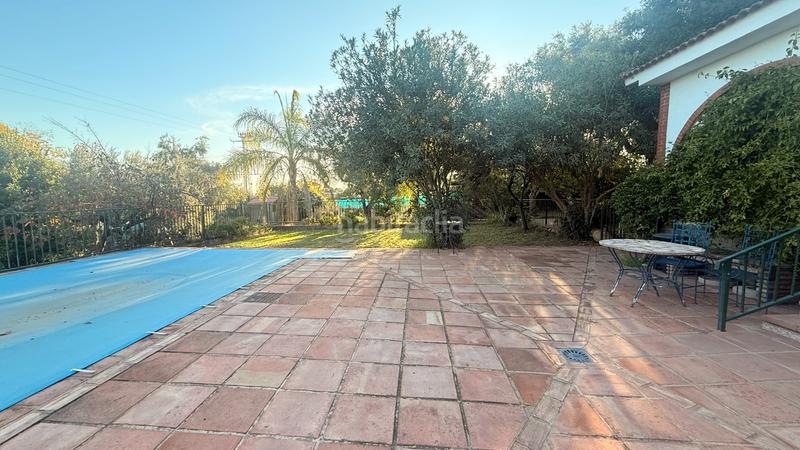 Foto 230e6907-8b09-40fb-bc43-e52fde8e02c5. Casa amb xemeneia calefacció aparcament piscina a Almodóvar del Río