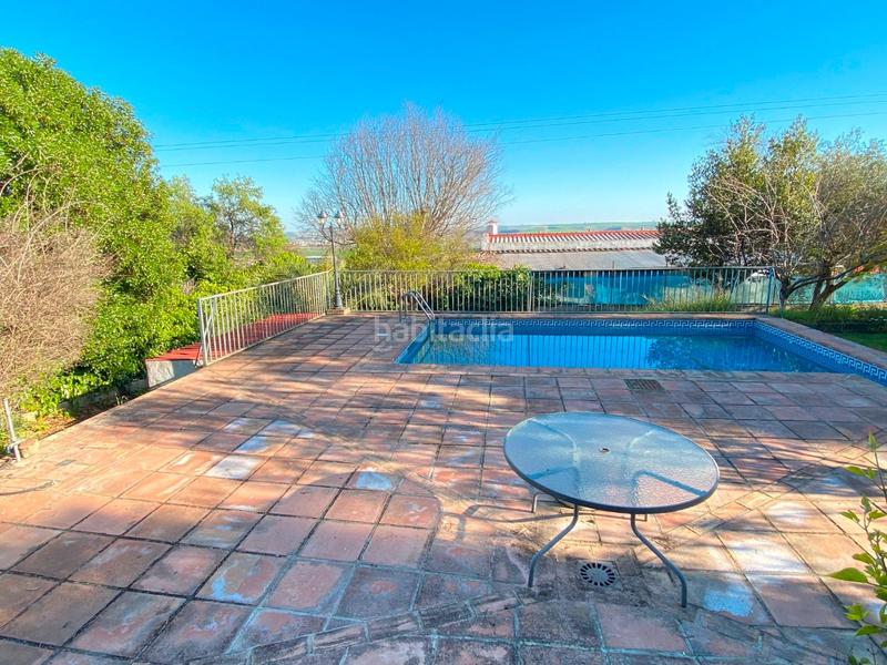 Foto 7eeaf101-9d34-45ff-948c-af0504bb83d9. Casa amb xemeneia calefacció aparcament piscina a Almodóvar del Río