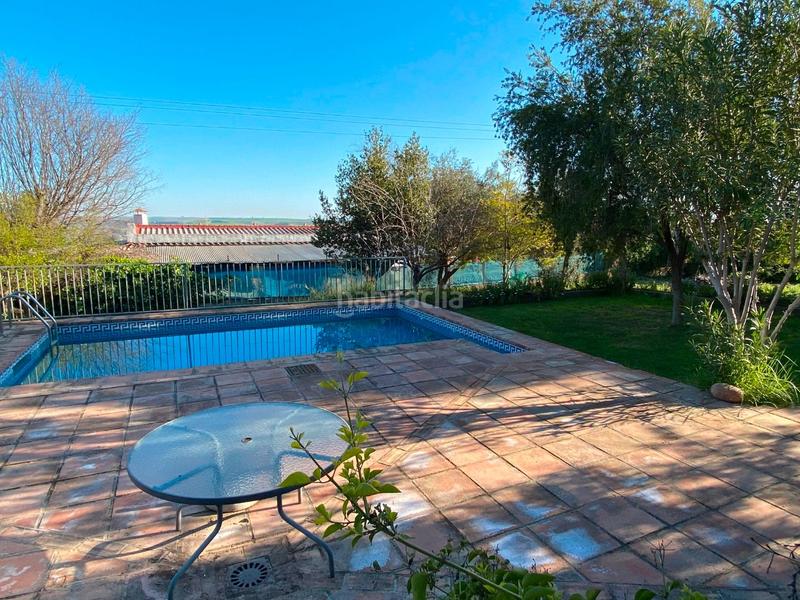 Foto c1e06fb4-4717-4266-8075-92d15712ee92. Casa amb xemeneia calefacció aparcament piscina a Almodóvar del Río