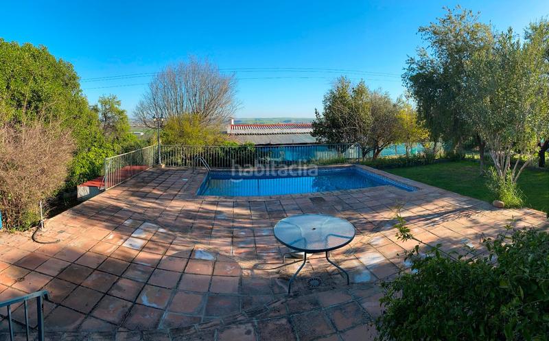 Foto d1453fb3-9279-4c38-bb76-33c51a752b29. Casa amb xemeneia calefacció aparcament piscina a Almodóvar del Río