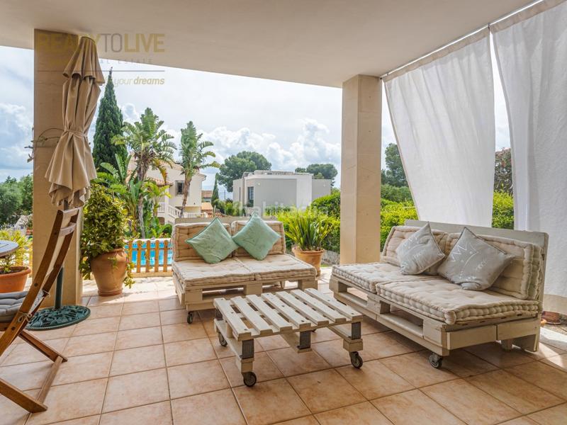 Foto aaa82a1d-a1d4-4ef0-b8b8-114697db6c74. Casa adossada amb aparcament piscina a port d´Alcúdia-platja dálcúdia Alcúdia