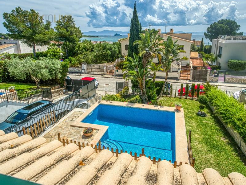 Foto fc41002f-8af9-4a3c-a5fd-08d32306e6ae. Casa adossada amb aparcament piscina a port d´Alcúdia-platja dálcúdia Alcúdia