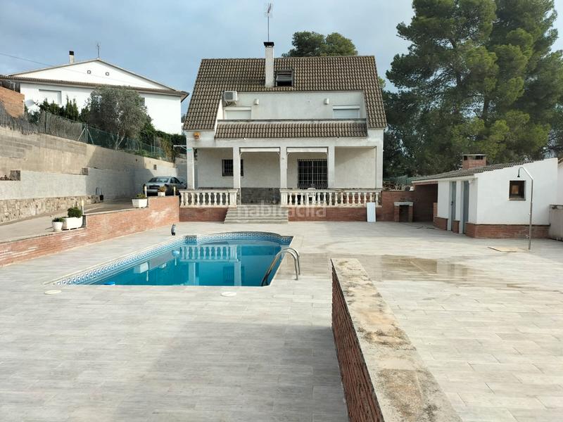 Foto 06a588c8-d340-46d5-ac30-dcd9e31fd8df. Casa amb xemeneia calefacció aparcament piscina a Lliçà d´Amunt