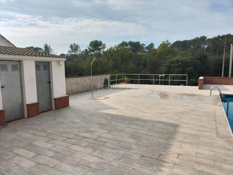 Foto cd5602af-54df-42b6-99ab-2ce34d4b36b5. Casa amb xemeneia calefacció aparcament piscina a Lliçà d´Amunt