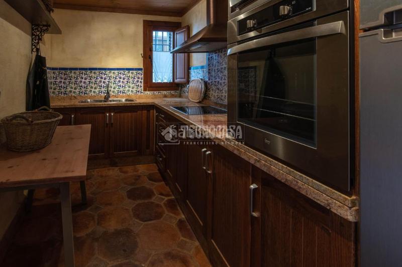 Foto bfbd4e51-f49b-4c94-b6ae-f2e6ea879824. Casa aparellada a Guadix