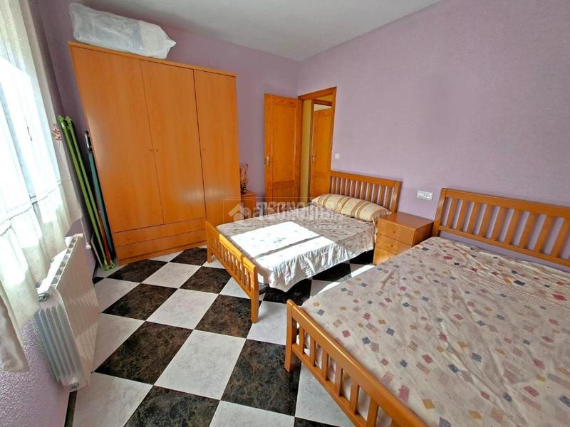 Foto bd2af78c-b20c-4bd3-88be-8e54fe704c47. Casa aparellada amb calefacció aparcament a Benalúa