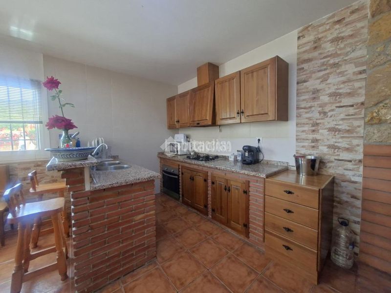 Foto 041c4de6-d329-4a24-9474-d7221435ebe4. Casa aparellada a Guadix