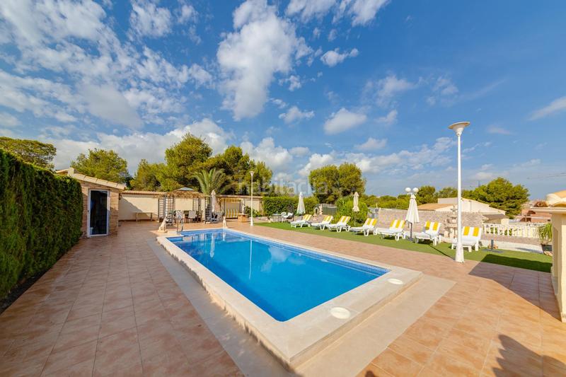 Foto 662eb5c3-04b9-478a-a128-31ffd2a38571. Chalet avec chauffage parking piscine dans Villamartín-Las Filipinas Orihuela