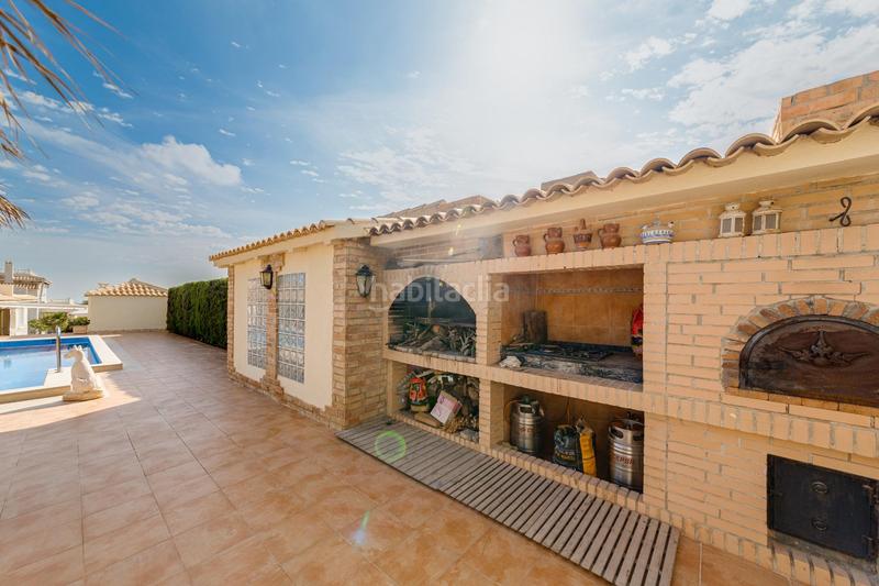 Foto 89b4e8f9-b68e-40b8-9ff6-5d958a46ed8b. Chalet avec chauffage parking piscine dans Villamartín-Las Filipinas Orihuela