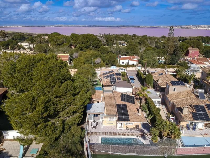 Foto 57cba239-8b1d-4c25-ad06-a62e29ee863a. Chalet con riscaldamento parcheggio piscina in Los Balcones-Los Altos Torrevieja