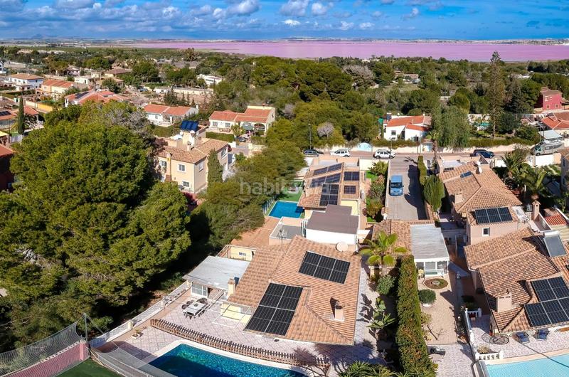Foto 8d2cdebb-bbc4-40cb-966e-2030d47e10a8. Chalet con riscaldamento parcheggio piscina in Los Balcones-Los Altos Torrevieja