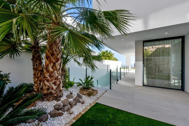 Foto bc59d2fd-8458-4e80-a042-9526821c0c58. Chalet con parcheggio piscina in Golf Bahía Finestrat