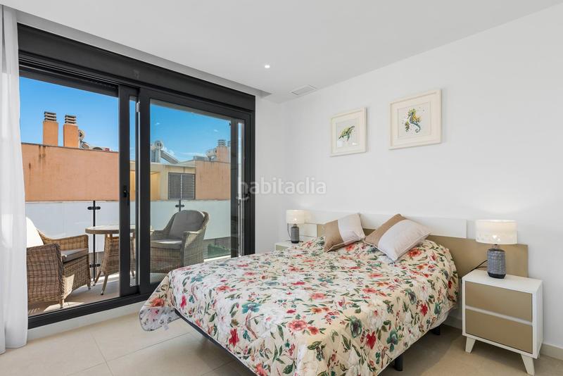 Foto 3f884bf9-f229-4a04-a9f6-09c95593e5b8. Casa aparellada amb aparcament piscina a Los Secanos Guardamar del Segura