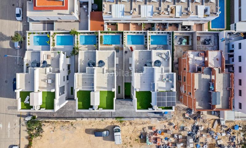 Foto afa363f7-6adc-4e53-beff-b48f52b59cdf. Casa aparellada amb aparcament piscina a Los Secanos Guardamar del Segura