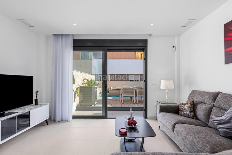 Foto b5c082ce-9770-432f-9c01-38282825c866. Casa aparellada amb aparcament piscina a Los Secanos Guardamar del Segura