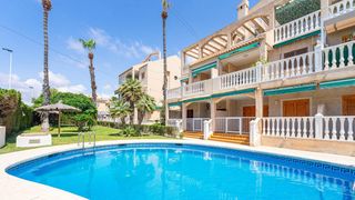 Apartament  Gandi. Apartamento de 2 dormitorios con piscina comunitaria en los frut