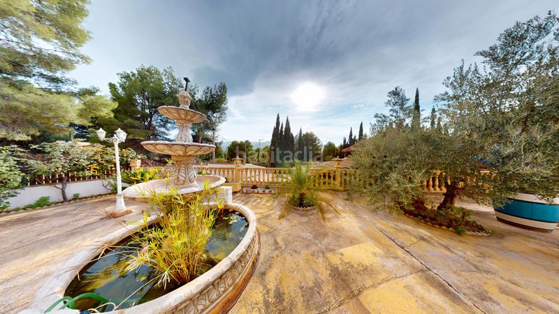 Foto 0237a685-98a2-411d-9777-1d932a0507b9. Chalet ?? chalet reformado con vistas al maigmó, piscina y zona chill-out en finca terol () en Tibi
