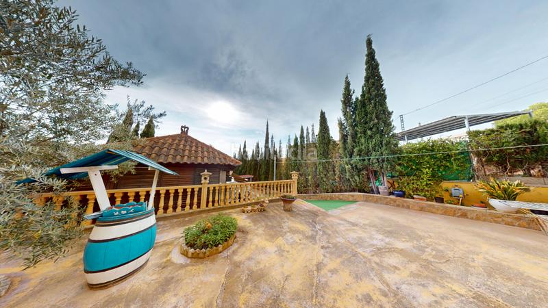 Foto 4add152e-ad7f-478c-8acc-6531e958cf1c. Chalet ?? chalet reformado con vistas al maigmó, piscina y zona chill-out en finca terol () en Tibi