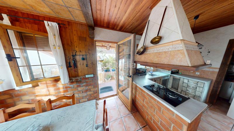 Foto 9903f81d-f8c6-41fc-80ca-766f89ec6510. Chalet ?? chalet reformado con vistas al maigmó, piscina y zona chill-out en finca terol () en Tibi
