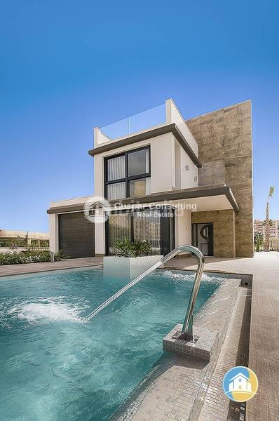 Foto 4c289632-3c45-415e-b1b1-b30074e6129e. Chalet with parking pool in Campoamor Orihuela