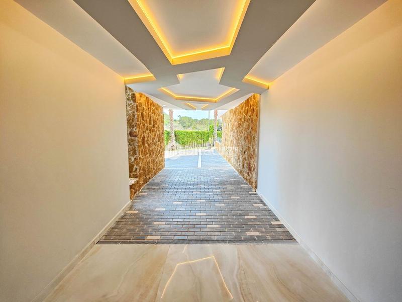 Foto b4869930-61a1-4414-b53d-d785373e4e67. Appartement mit parking pool in Campoamor Orihuela