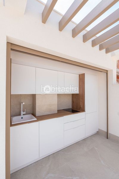 Foto 065259f3-fe05-4509-9f93-5ed7a078c902. Casa adossada amb calefacció aparcament piscina a Alcázares (Los)