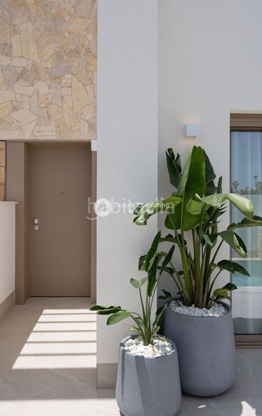 Foto 889b8365-e6c6-4691-94a1-3d81e9b7d654. Casa adossada amb calefacció aparcament piscina a Alcázares (Los)