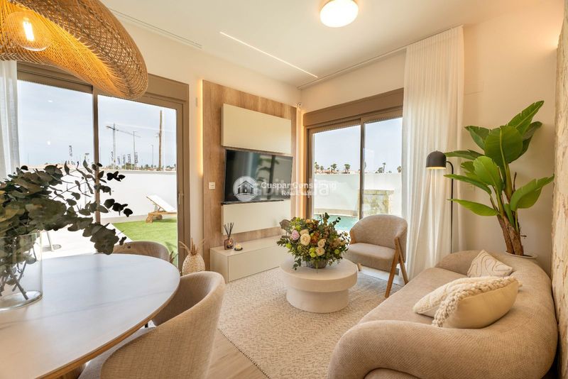 Foto f6e2a085-1934-4c58-bb3f-2ed776ae2950. Casa adossada amb calefacció aparcament piscina a Alcázares (Los)